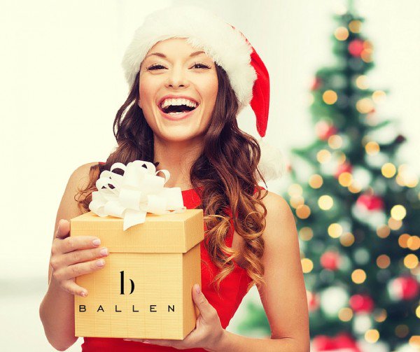 lori ballen example image of woman holding gift made in canva